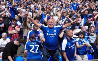 Town fans celebrating promotion to the Premier League