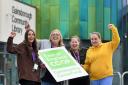 Suffolk Libraries team celebrate their Community Cares Fund donation at Gainsborough Library, Ipswich. (East of England Co-op/Warren Page)