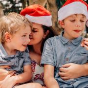 Laura Walker from Ipswich, Australia, enjoying the warm, Christmas weather with her two sons, Henry and Lachlan