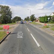 Temporary traffic lights have been put in place in Woodbridge Road