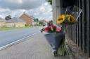 Flowers left at the scene of a fatal crash on the A12 in Wrentham.