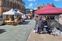 The Artisan and Producers' Market on Ipswich Cornhill went ahead despite the wind.