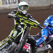 Jason Doyle rears on the outside of Richie Worrall in heat five.