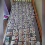 Around £12k in cash was found during a police search