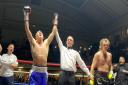 Suffolk boxer Jordan Warne has his hand raised after beating Robbie Chapman on his pro debut at the iconic York Hall