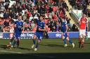Sam Morsy wheels away after putting Ipswich in front at Fleetwood Town.