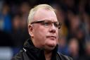 Steve Evans has left Gillingham after his side were thumped 4-0 by Ipswich Town yesterday
