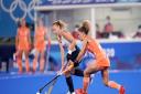 Great Britain's Hannah Martin (left) and Netherland's Maria Verschoor battle for the ball