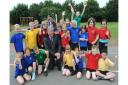 Sir Keith Mills, deputy director of the 2012 Olympics, with pupils at Heath Primary School in Kesgrave in 2008