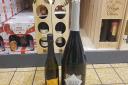 The three-litre bottle of Prosecco next to an average bottle of wine. Picture: WILL JEFFORD