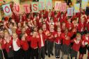 Pupils and Staff at Springfiled Juniors School, Ipswich, celebrate an Outstanding Ofsted report