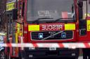 Children have been praised for their help in stopping a fire from spreading at a home