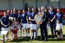 Felixstowe& Walton were presented with the Thurlow Nunn League tunners-up shield before the game by League chairman, Peter Hutchings. Photo: PAUL VOLLER