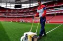 Writtle College groundsman student Tom Grafen from Glemsford at the Emirates Stadium, home of Arsenal Football Club, where he is an apprenice.