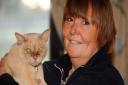 Bernie Ingram after being reunited with her missing cat