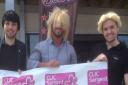 Charlie Manning, centre, and staff members John Cox and Lylle Bonne, in wigs, for a special charity night for the Clic Sargent childrens cancer charity