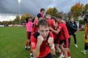 Needham Market players celebrate beating Maidstone United to reach the first round of the FA Cup for the first time ever