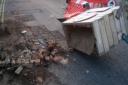 A road barrier in a rat run Ipswich street has been knocked over