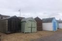 Some beach huts at Felixstowe have been damaged during the high tides and strong winds
