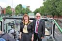 Ipswich mayor Lynne Mortimer with her husband James Hayward on an open-top bus in the cavalcade.