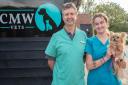 Tom Webster is delighted to have opened up a new vet surgery in Claydon. Pictured with nurse Molly holding dog, Twiggy. Image: Charlotte Bond