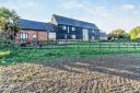 This five bedroom barn conversion has stunning views of the Suffolk countryside