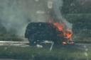 A car is ablaze on an A14 slip road near Ipswich