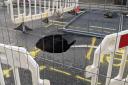 The huge sinkhole shut Foxhall Road earlier this month