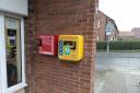 Part of the funds have been used to install a defibrillator at Maidenhall Green Shopping Parade. Image: IBC