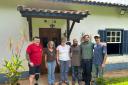 Combat2Coffee's founder Nigel Seaman (left) met the Brazilian farmers who grow his coffee