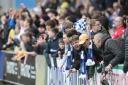 Great support - Colchester United fans after their side drew with Crewe Alexandra to secure their League Two status
