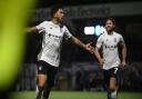 Macauley Bonne celebrates scoring his 11th goal of the season in Tuesday night's 4-1 win at Wycombe.
