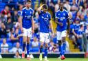 Conor Chaplin, Cameron Burgess and Rekeem Harper react during Ipswich Town's 5-2 home defeat to Bolton.