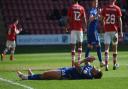 Cameron Burgess reacts after missing a chance at Crewe