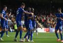 Town players celebrate Sone Aluko's two goals at Cambridge. But they proved not to be enough as Ipswich drew 2-2 earlier in the season.