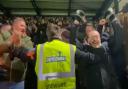 Ipswich Town fans celebrate during the Blues' big 4-1 win at Wycombe last night