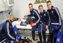 Ipswich Town players visit Ipswich Hospital to give out presents. L-R: David McGoldrick, Liam Baldry (6), Luke Chambers, Teddy Bishop and Alex Henshall.