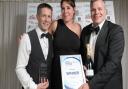 2019 Large Business award winners Chris Perry (left) and Guy Marshlain (right), with sponsor representative Emma Proctor-King (centre)    Picture: SARAH LUCY BROWN