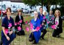 Each of these handcrafted 'blooms' was 'picked', raising over £30,000 for the appeal. Left to right: Ceri Meek, Laura Southgate, Harriet Dynver, Amy Hilling, Suzanne Holland, Julie Steele and Kim Collingridge