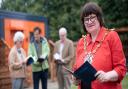Mayor of Ipswich Elizabeth Hughes handed out books to new residents in Whitton's microhomes by the Poet Lauriate, Simon Armitage. Picture: Sarah Lucy Brown