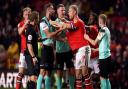 Charlton Athletic\'s Jayden Stockley and Portsmouth\'s Clark Robertson confront each other before Portsmouth\'s Marlon Pack (not pictured) is sent off during the Sky Bet League One match at The Valley in midweek. Pompey will be looking to bounce back