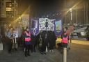 More than 100 protesters joined together for a Reclaim the Night march along the Waterfront to call for the end of violence against women.
