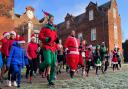 Runners dressed as elves, Santa Claus and Christmas trees gathered at Christchurch Park today for a festive-themed fun run.