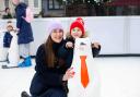 Julia and Hector enjoy the ice skate rink on Ipswich Cornhill
