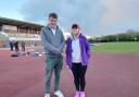 Tom Hunt at Northgate Athletics Track with Chair of Ipswich Harriers, Mandy Godbold