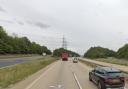 A tractor with a flat tyre is causing delays near an A14 junction