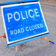 The B1116 has been closed in both directions following a car crashing into a telegraph pole.