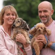 Hundreds of dog owners and their pooches visited Helmingham Hall for the return of Suffolk Dog Day. Lisa Anthony with Kitty and Robert Hollingsworth with Fred.