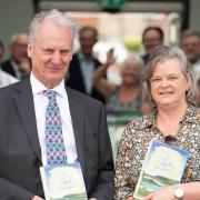 Mary and John James from Aldeburgh Bookshop with A New Suffolk Garland.