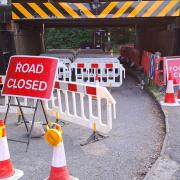 The road underneath the railway bridge in Needham Market has been blocked